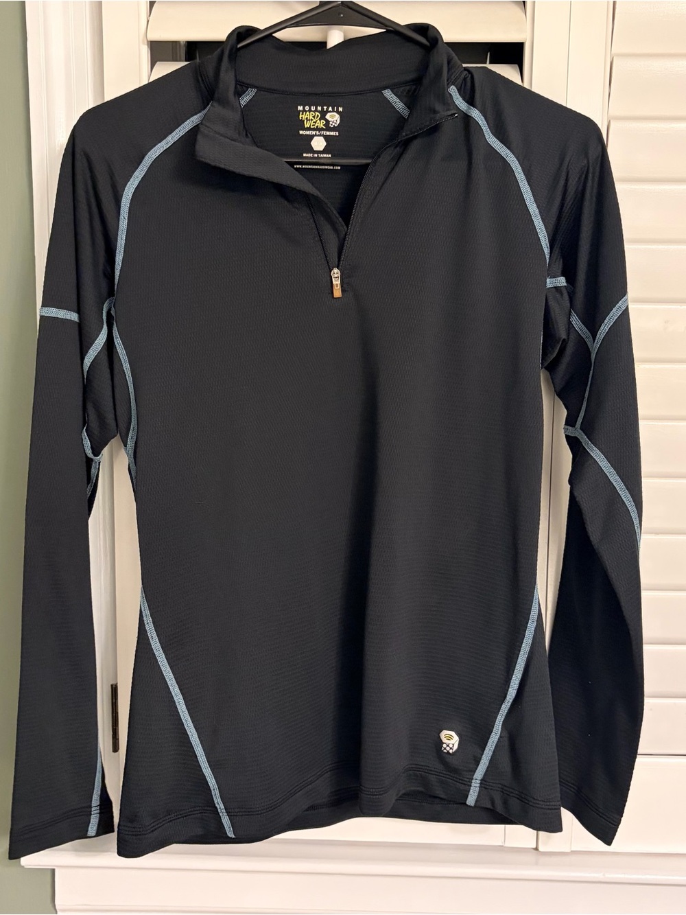 Mountain Hardwear women’s Black Zip-Top with Light Blue Stitching